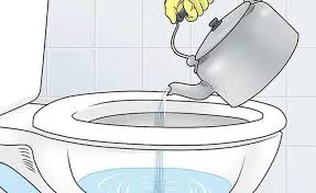 dùng nước ấm để thông